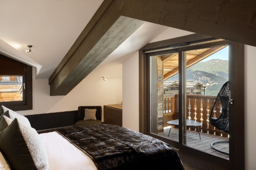A guest room at Six Senses Courchevel