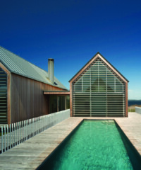 With features from koi ponds to swim-up bars to fire pits, these luxury pools serve as exotic patio retreats