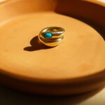 Palm Beach resident Courtney Leidy launches a fine jewelry line including a selection of pendants that are reversible and stackable